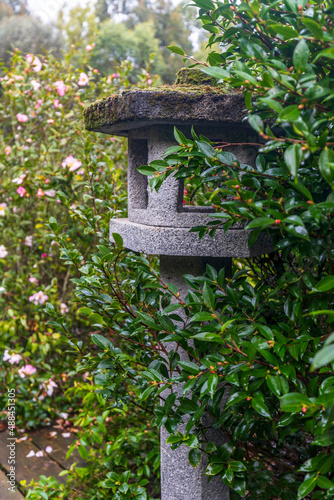 Stone Japanese lantern on the garden