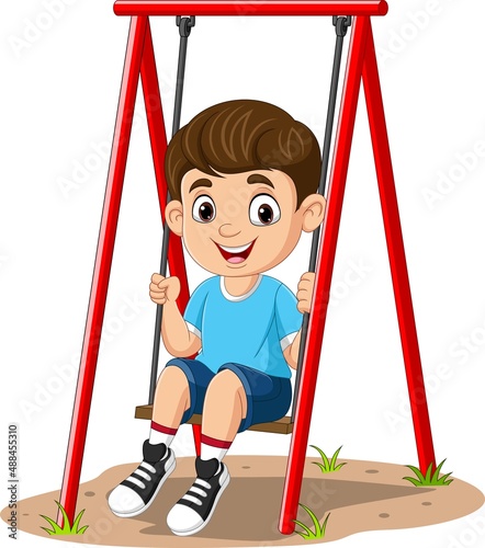 Cartoon little boy playing swing in the park