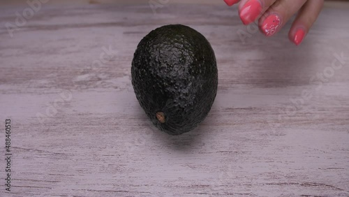 cutting avocado fruit with knife slow motion 4k