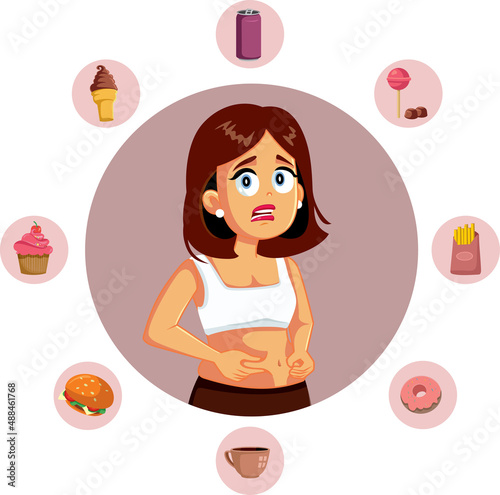 Woman Surrounded by Fast Food Holding Her Belly Fat
