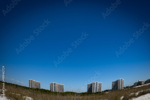Condo buildings erected next to tigertail beach in Marco Island, South Florida photo