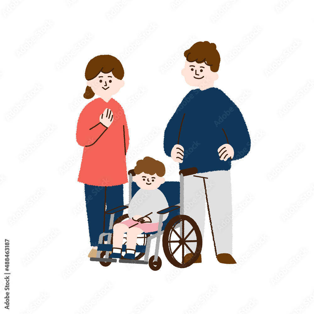 車椅子に座る男の子と両親