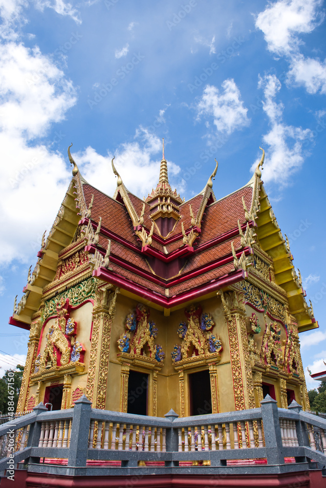 Buddhist pagoda buildings and blue sky background in Wat Khoa Noi Temple. Thailand