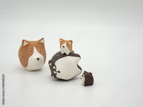 Lovely clay dog on a white background
