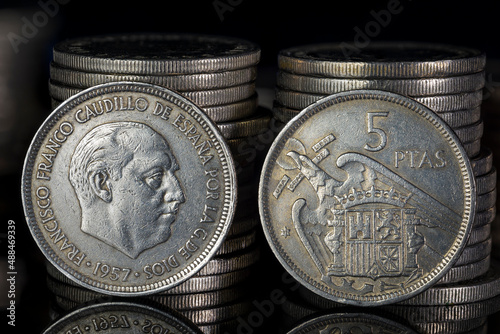 Francisco Franco Five Pesetas Coin 1957 Obverse Reverse Close Up Coin Stacks Black Background Macro