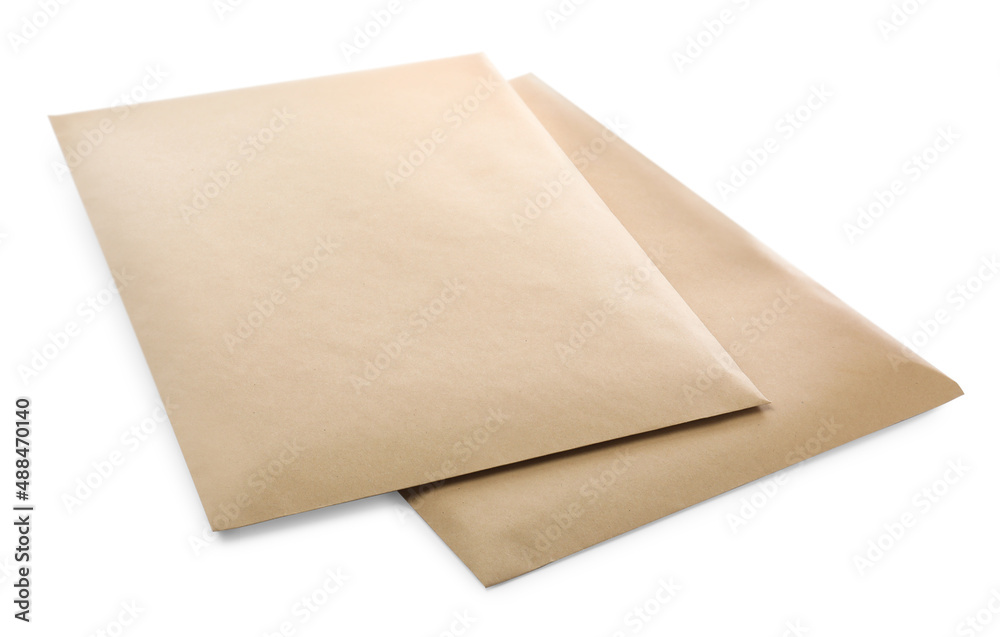 Blank kraft paper envelopes on white background Blank kraft paper envelopes on white background