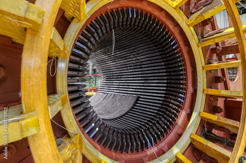 Konstfotografi Large electric motor with color details in plant workshop