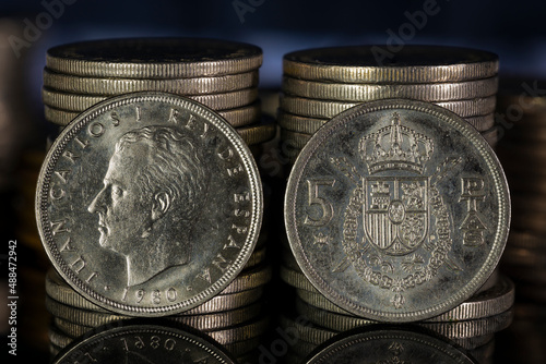 Juan Carlos I King of Spain Five Pesetas Coin 1980 Obverse Reverse Close Up Stacks Black Background Macro photo