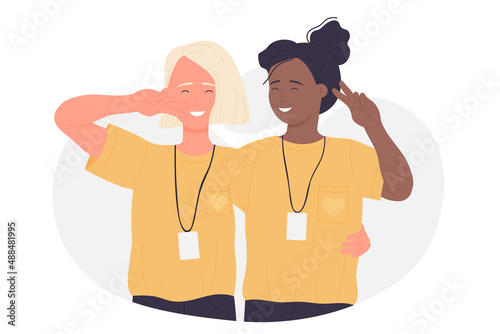 Happy smiling multicultural female volunteers. Cheerful activists community volunteering flat vector illustration