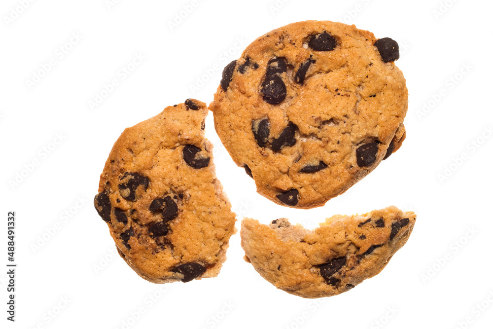 A whole and broken cookie with chocolate chips on a white background. A whole and broken cookie with chocolate chips on a white background.