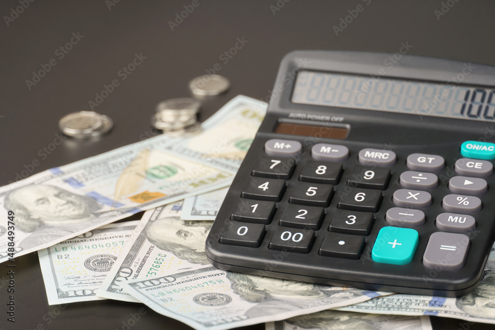 calculator with dollars. business and economy concept. calculator with dollars. business and economy concept.