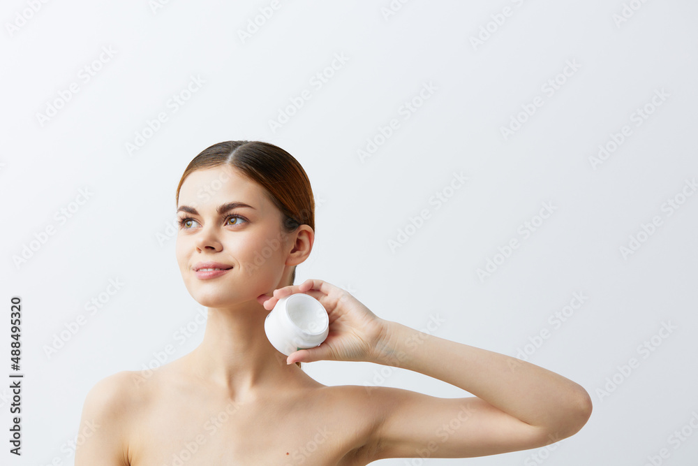 young woman body cream posing clean skin care attractive look light background young woman body cream posing clean skin care attractive look light background