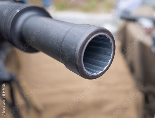 rifled muzzle of a machine gun close-up