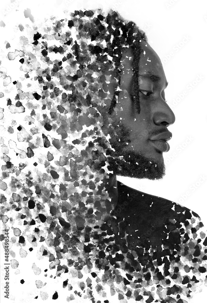 A profile portrait of a man combined with black ink splashes. Paintography. A profile portrait of a man combined with black ink splashes. Paintography.