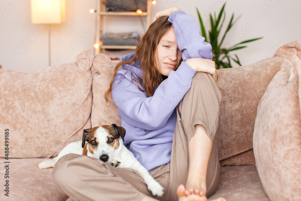 Sad depressed young adult woman crying alone at home, upset Sad depressed young adult woman crying alone at home, upset
