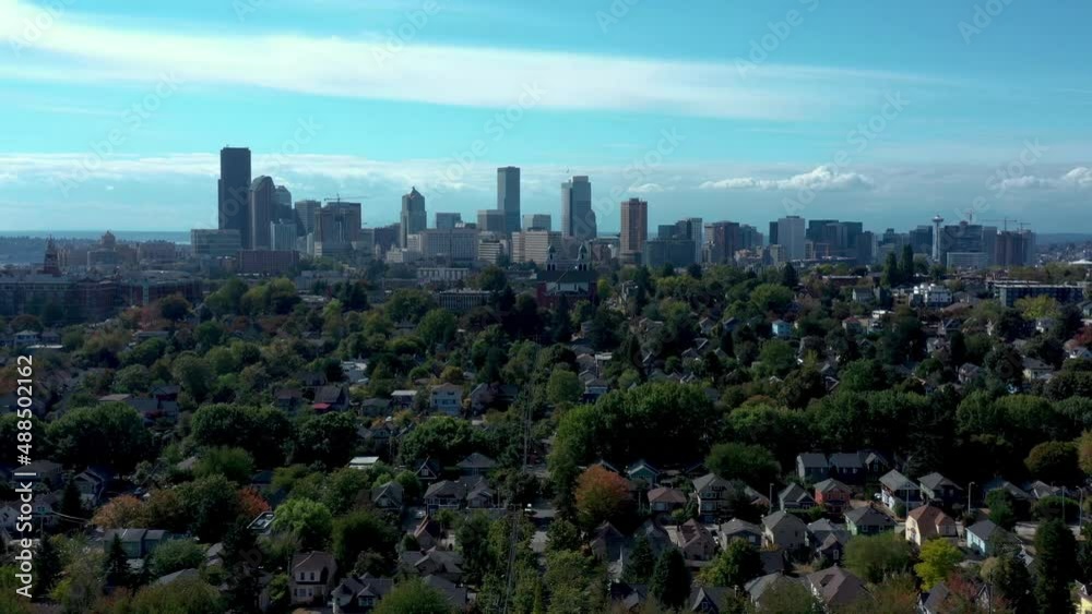 Drone Flying over the Madrona neighborhood of Seattle with views of the city, the olympic mountains, the space needle and lots of neighborhood. Drone Flying over the Madrona neighborhood of Seattle with views of the city, the olympic mountains, the space needle and lots of neighborhood.