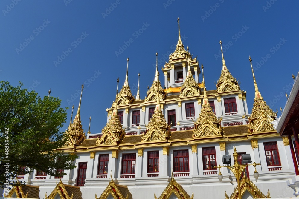 Naklejka premium Loha Prasat Wat Ratchanatdaram with the characteristics of Thai architecture and architecture as a 3-story castle with 37 golden spires.