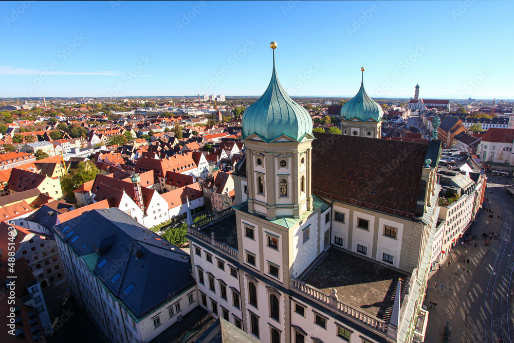Augsburg, Bavaria, Germany, view over the historic townhall and the Maximilan Street in bright sunshine to highlight the beauty of the swabian town With view of the Alps due to a weather phenomenon.
