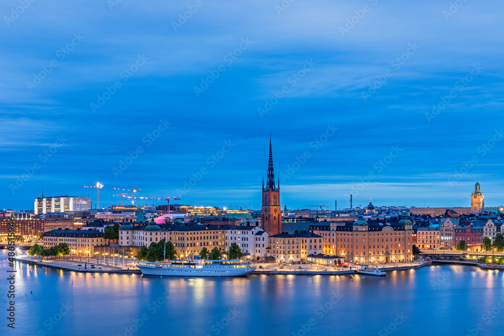 Sweden, Stockholm County, Stockholm, Skyline ofRiddarholmenat blue dusk Sweden, Stockholm County, Stockholm, Skyline ofRiddarholmenat blue dusk