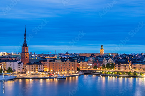 Sweden, Stockholm County, Stockholm, Skyline of Riddarholmen at blue dusk