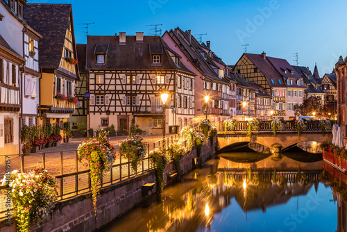 France, Alsace, Colmar, Long exposure of Lauch river canal in Little Venice at dusk photo