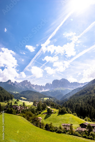 Italy, South Tyrol, Saint Cyprian, Mountain village in Fassa Valley during summer photo