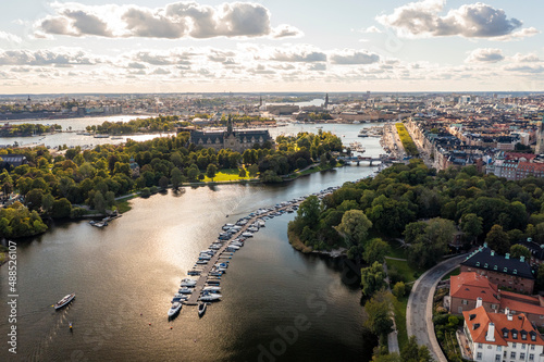 Sweden, Stockholm County, Stockholm, Aerial view of Djurgarden and Nobel Park at dusk photo