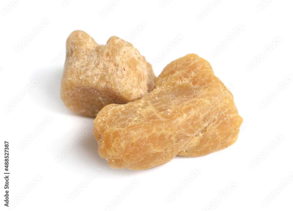 Asafoetida, also spelled asafetida. Isolated on white background Asafoetida, also spelled asafetida. Isolated on white background