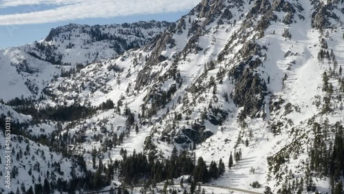 Aerial of heavy snowfall on the mountains surrounding Emerald Bay Lake Tahoe. photo