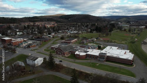 Aerial View of Mansfield, Tioga County, Pennsylvania USA, Buildings and Road Traffic at Fall Season, Drone Shot photo