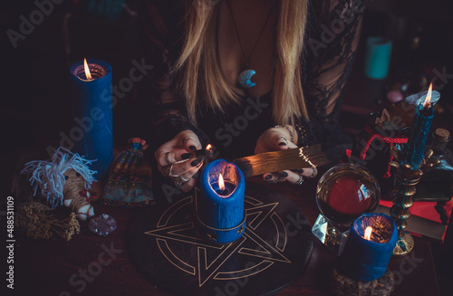 Concept of fortune telling and predictions of fate, magic and wicca elements on a table, witch look photo