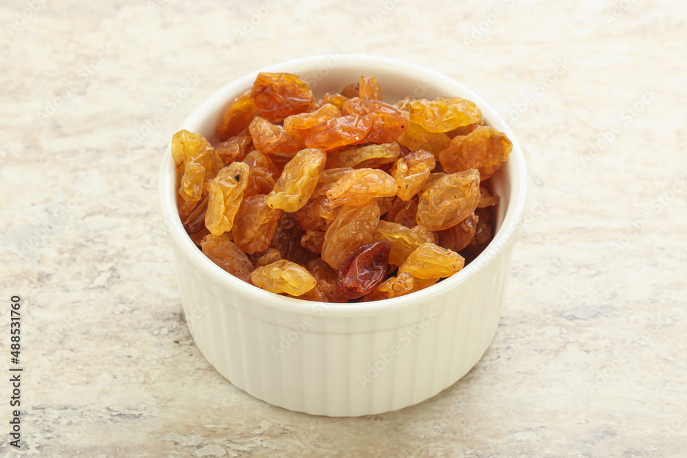 Sweet yellow raisin in the bowl