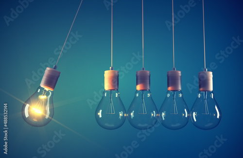 Newton's cradle made of light bulb.