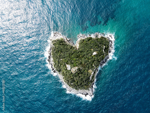 Obraz na plátně Aerial view of Bergeggi island, heart island from above, in Liguria, north Italy