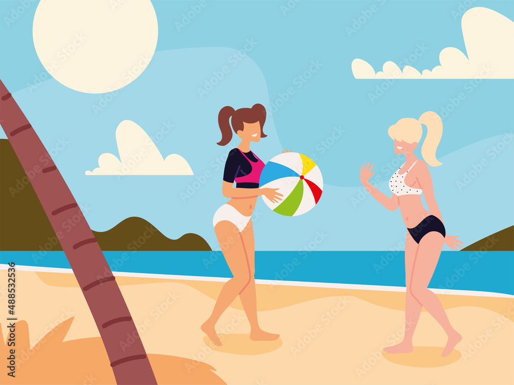 women with beach ball