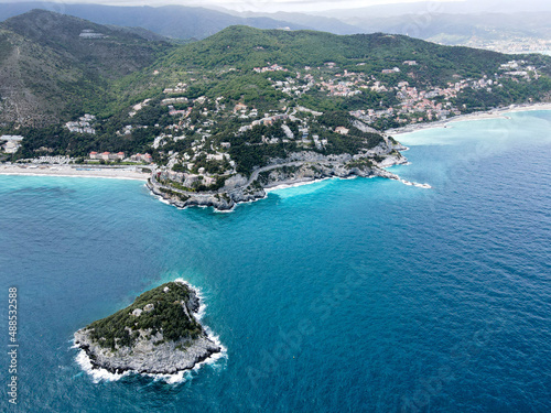 Aerial view of Bergeggi island, heart island from above, in Liguria, north Italy. Drone photography of the Ligurian coast, province of Savona with Spotorno and the island of Bergeggi. photo