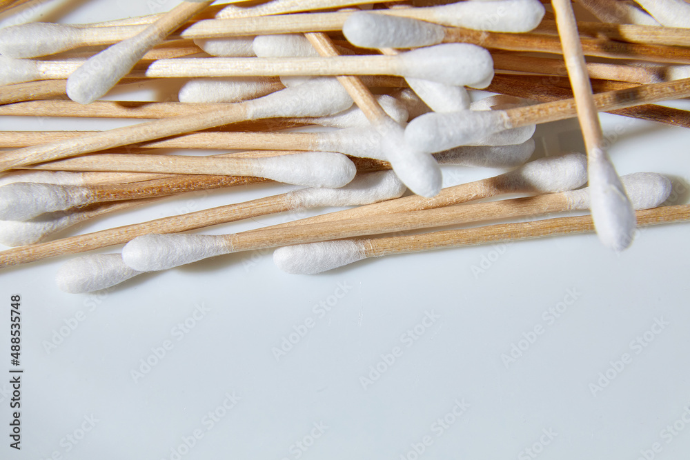 Flat lay Eco-friendly cotton swabs, bamboo cotton buds Flat lay Eco-friendly cotton swabs, bamboo cotton buds