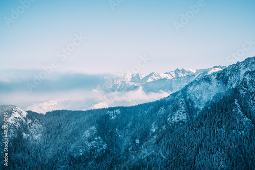 Fototapeta Naklejka Na Ścianę i Meble -  Blue snow covered mountains landscape in the Tatra mountains in Poland
