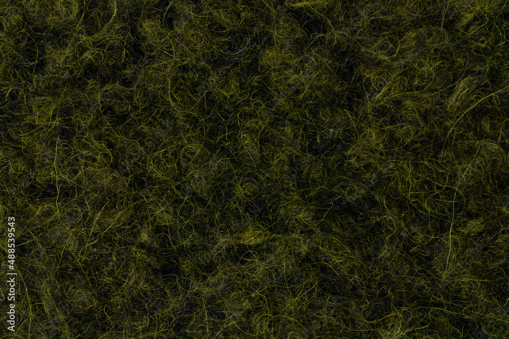 Dark green wool texture closeup Dark green wool texture closeup