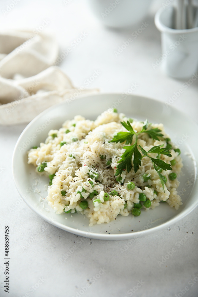 Traditional Italian risotto with green pea Traditional Italian risotto with green pea