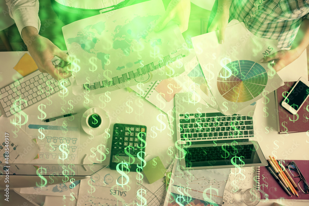 Double exposure of man and woman working together and financial chart hologram drawing. market analysis concept. Computer background. Top View. Double exposure of man and woman working together and financial chart hologram drawing. market analysis concept. Computer background. Top View.