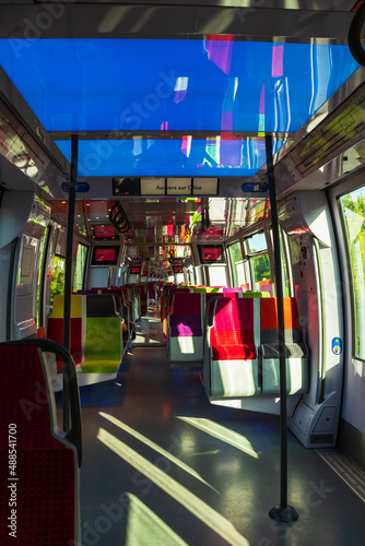 Colorful trip. Train interior. Modern public transportation in Ile-de-France. France.