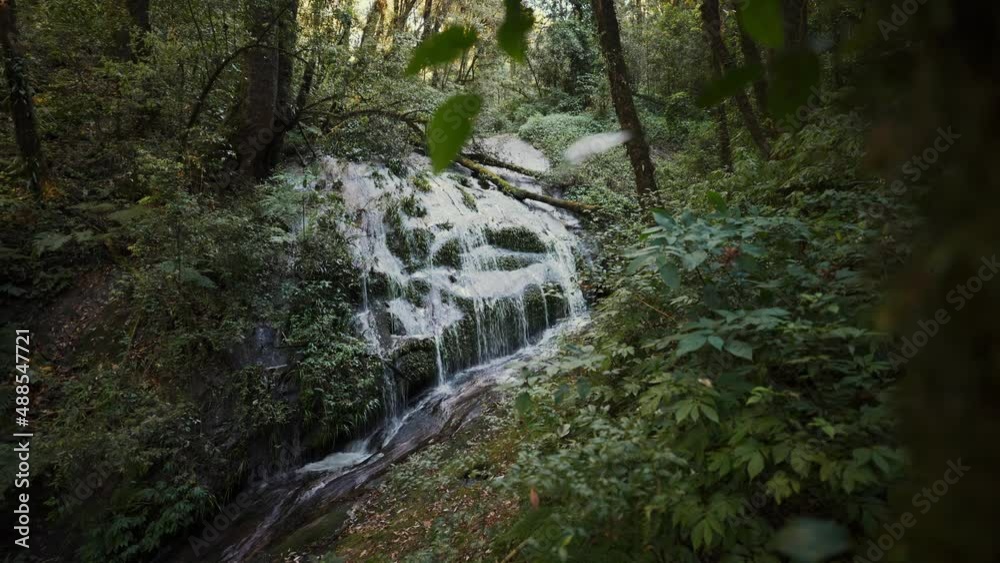 Small waterfall from the river in the mountains. Nature and ecology. slow motion. Small waterfall from the river in the mountains. Nature and ecology. slow motion.