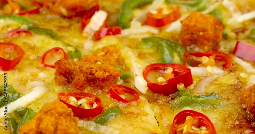 Rotating of Spicy Chicken Crispy tasty Italian pizza, Mushroom, Red Chilli peppers, Green capsicum, Onion, Mozzarella cheese with tomato sauce Rotating of Spicy Chicken Crispy tasty Italian pizza, Mushroom, Red Chilli peppers, Green capsicum, Onion, Mozzarella cheese with tomato sauce