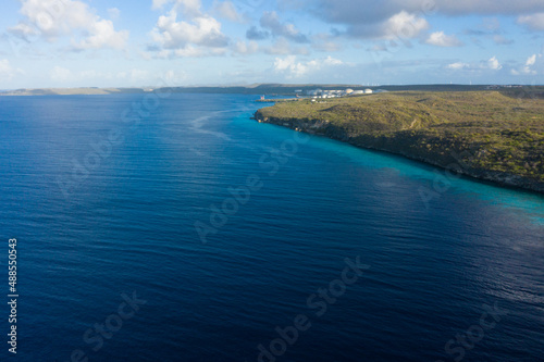 Aerial view of coast scenery with the ocean, cliff, and beach around Vaersenbaai area, Curacao, Caribbean