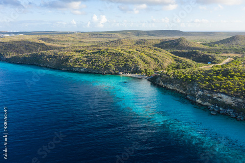 Aerial view of coast scenery with the ocean, cliff, and beach around Vaersenbaai area, Curacao, Caribbean