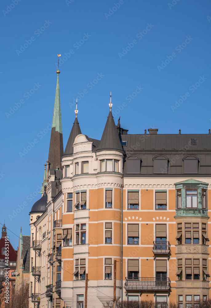 Old houses with a tower shaped as bay windows in the district Östermalm a sunny winter day in Stockholm