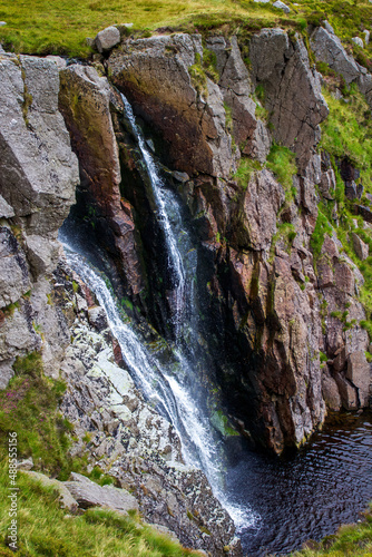 Waterfall falling from a high treshold photo