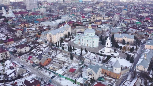 Winter view from the drone on the Alekseevo-Akatov monastery is surrounded by an old residential surroundings in Voronezh, Russia.  photo