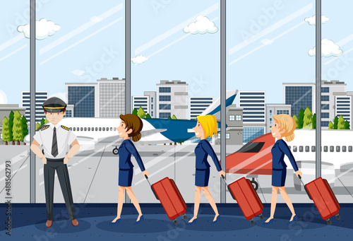 Flight attendants walking in airport terminal